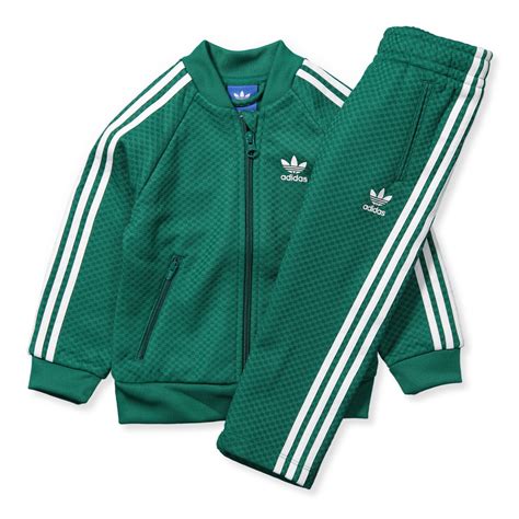 green adidas originals tracksuit.